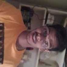 Picture of sushant wearing spectacles.