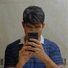19-year-old with blue polo shirt 