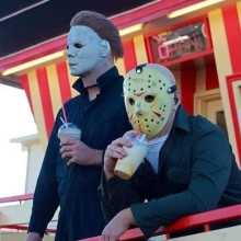michael myers and jason voorhees relaxing and sipping mocha together on a balcony