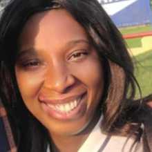 Headshot of Debbilicious. She's smiling.
