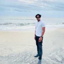 Athletic man with white shirt and black pant 