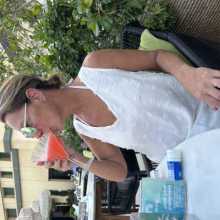 Woman drinking a cosmopolitan in Egypt
