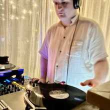 A picture of me, DJing with turntables and Records