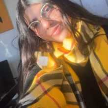 Camila, an 18-year-old girl, a brunette with brown eyes who loves Harry Potter and One Direction