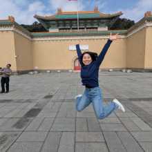 The picture is showing that I am jumping outside in Taiwan