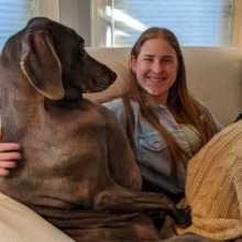 A picture of Sadie with her dog, Maggie 