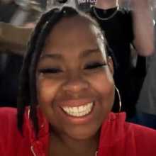 Smiling girl with red hoody