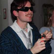 really cool looking guy with red hair and sunglasses