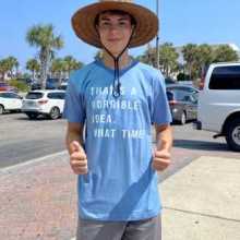 Caleb in hat and t-shirt