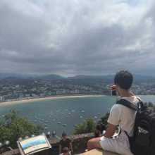 Me sitting above mountain in San Sebastian, Basque Country, Spain