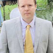 A picture of me in a suit.