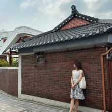 Me next to a hanok
