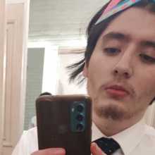 Mirror selfie of me, phone in hand