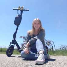 Picture of a girl with an electric scooter