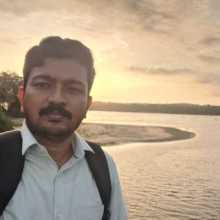 Casual profile picture near a river at sunset