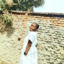 Pamela in a white dress