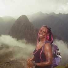 profile picture of girl in front of mountains