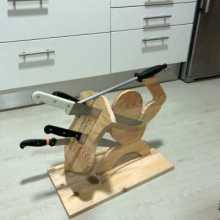 Wooden warrior with shield and spear, symbolizing my struggle and perseverance in learning English