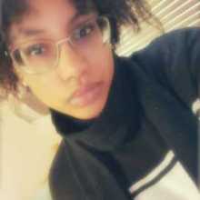 I am African American with short curly hair, glasses, brown eyes. idk what to put here lol