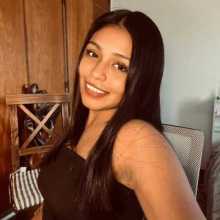 Psychology student from Argentina smiling at the camera. 