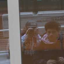 Two guys, I'm the one on the left holding a camera