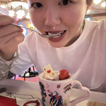 Bing is eating a dessert in Disney restaurant
