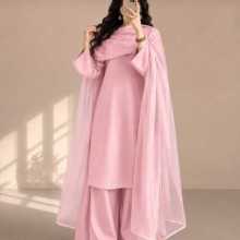 Person wearing a pink outfit.