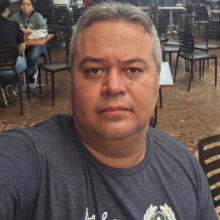 White man, with some grey hair.