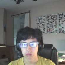 Guy with yellow shirt and glasses