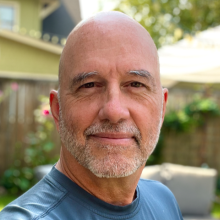 Outdoor head and shoulders portrait photo of James.