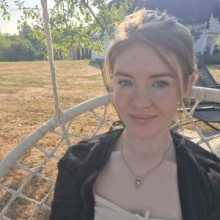 Rachel sitting in a chair in Croatia