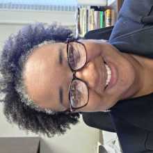 Picture of black woman in glasses